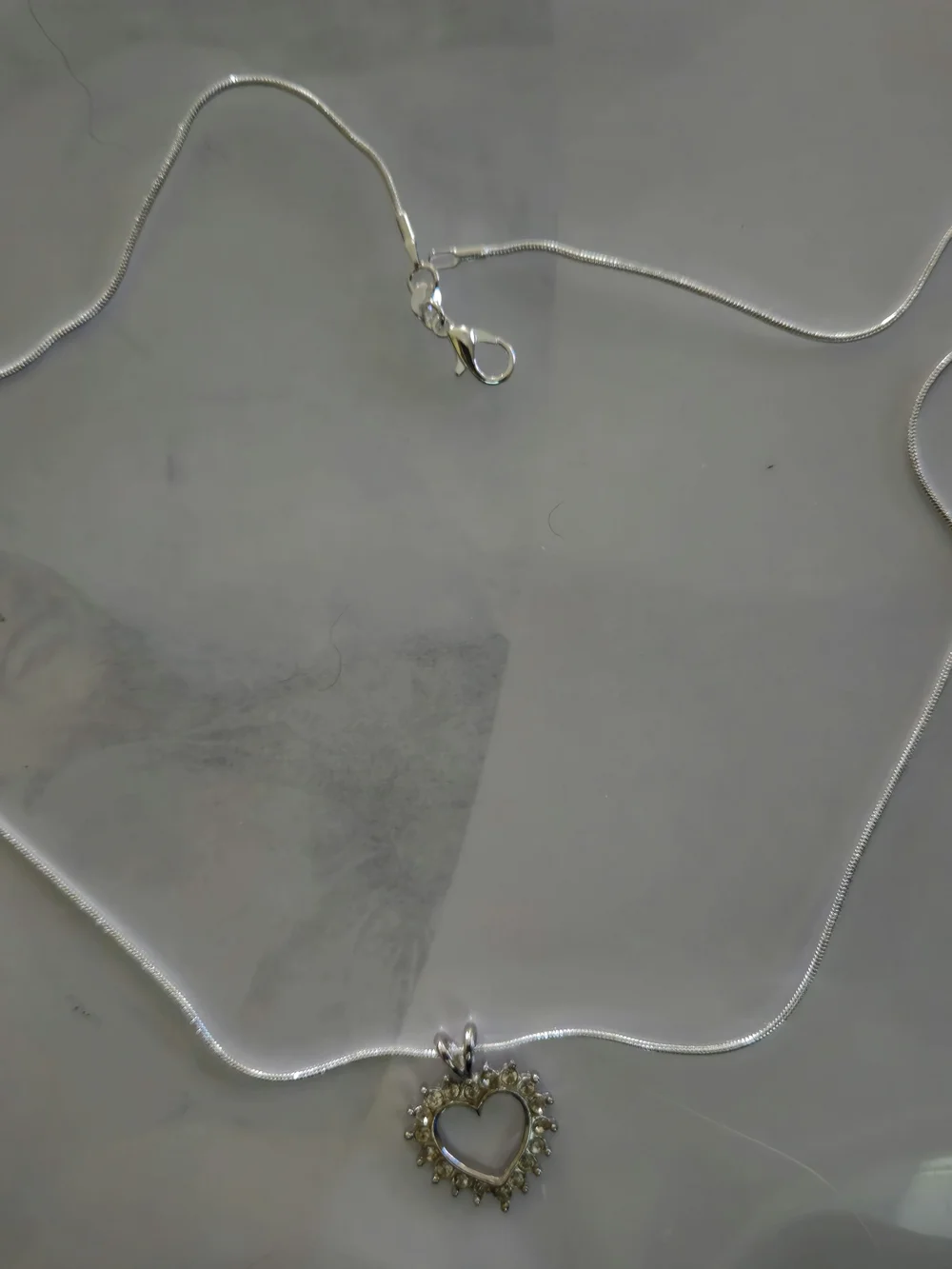 Sterling Silver Heart Pendant Necklace with Cubic Zirconia Accents - Silver